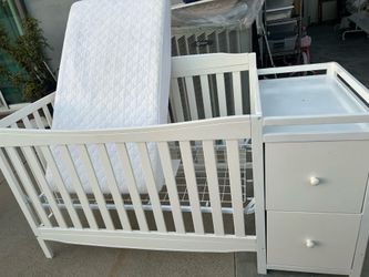 Crib with mattress and rocking chairs