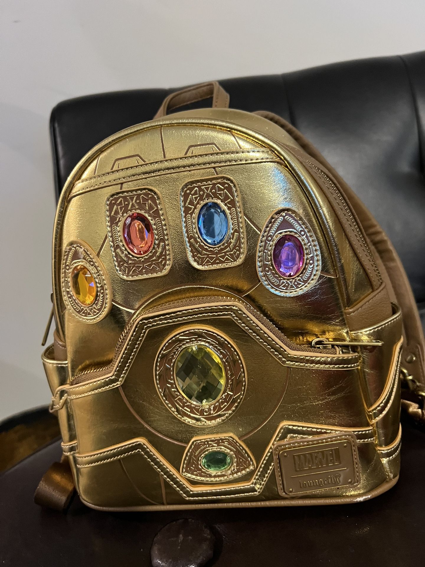Disney Marvel loungefly Infinity Stones Gauntlet Mini Backpack.