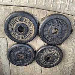 Four Solid Steel Weights $25
