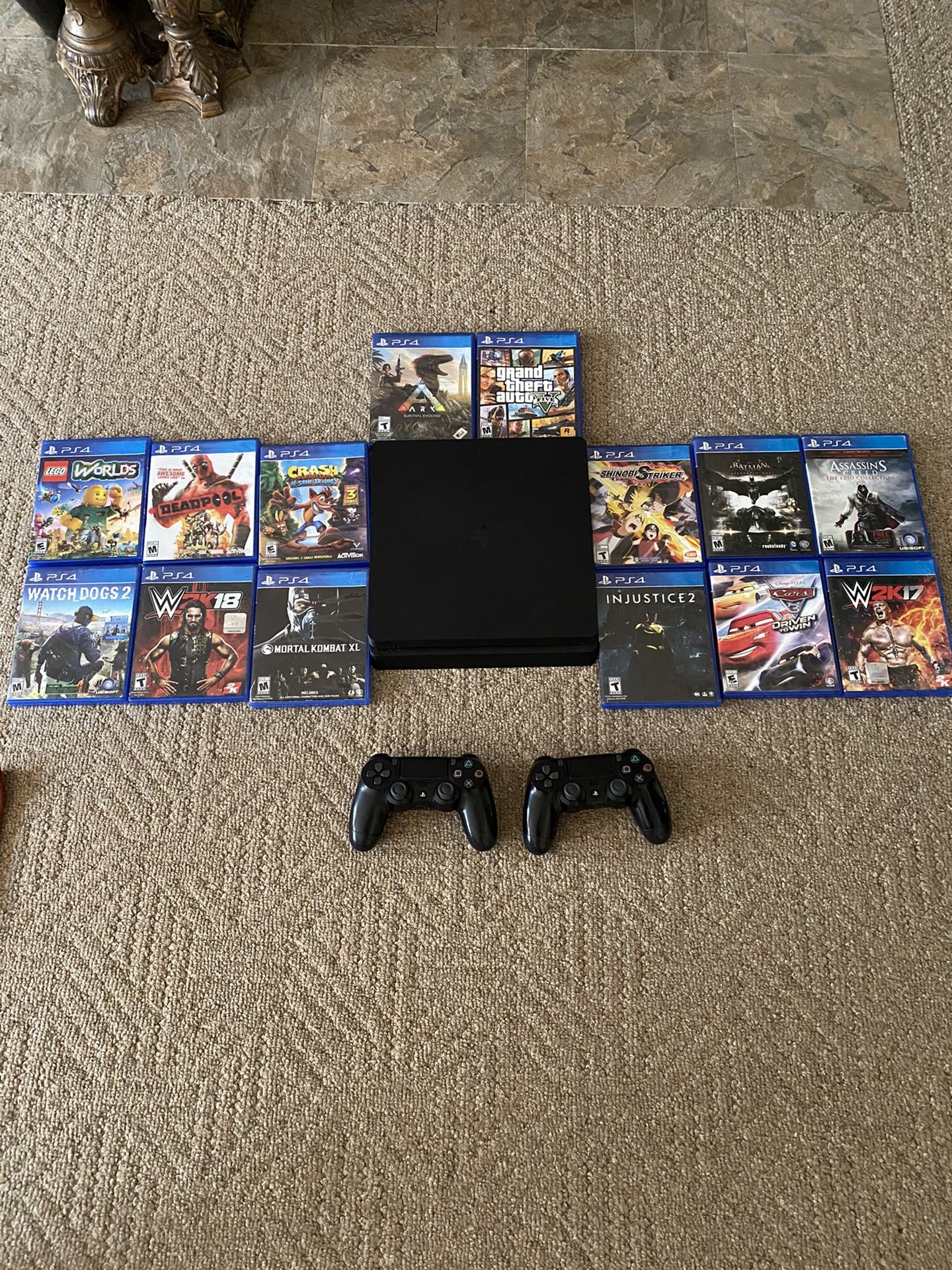 PS4 with 14 games and 2 controllers