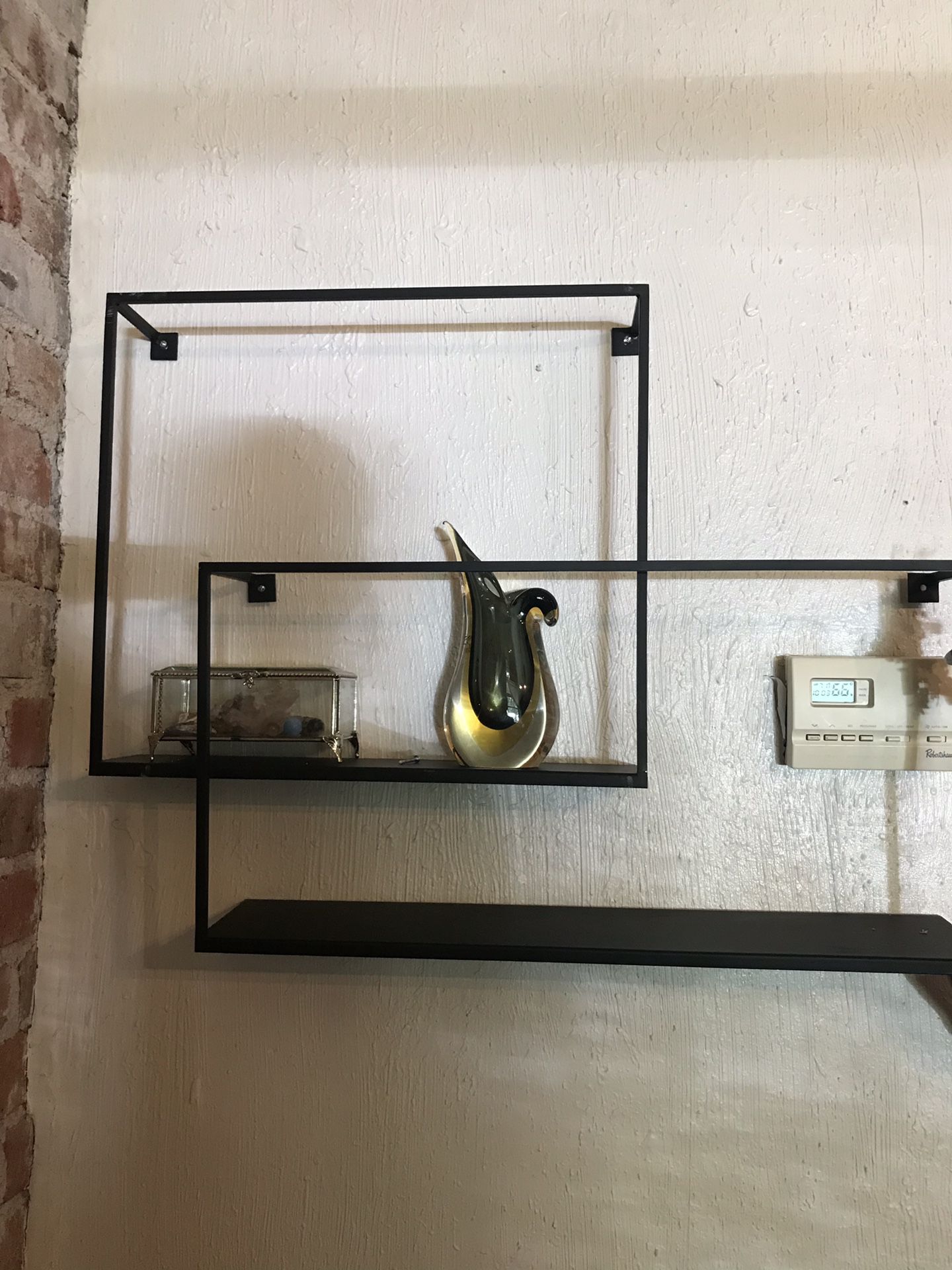 Modern asymmetrical metal shelves $15