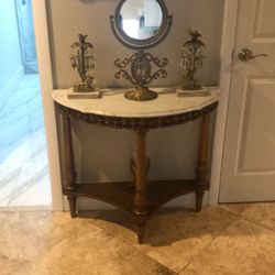 Marble table with two candle holder and Mira