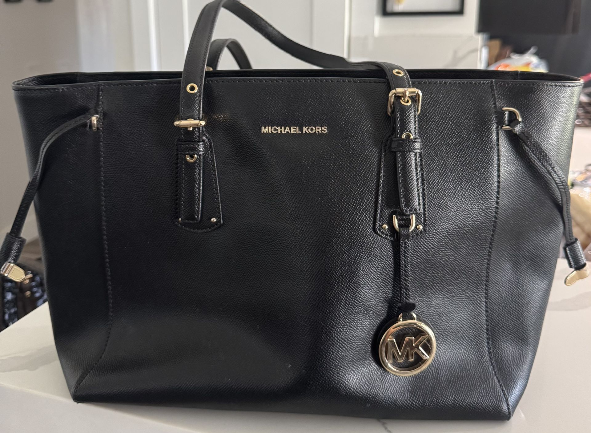👜