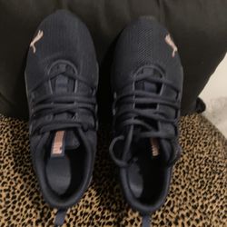 Selling a pair of PUMA Riaze Prowl Palm running sneakers in blue! Excellent condition like new They have a stylish design with a touch of rose gold ac