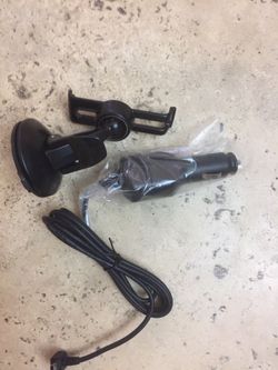 Garmin car charger and mounting rack. New