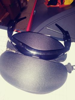 Brand new sunglasses with built-in camera bells and whistles