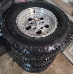 CHEVY OBS RIMS AND TIRES 235/75/15 KELLY EDGE AT TIRES 5 LUGS In great condition to be over 36 years old all aluminum wheels..