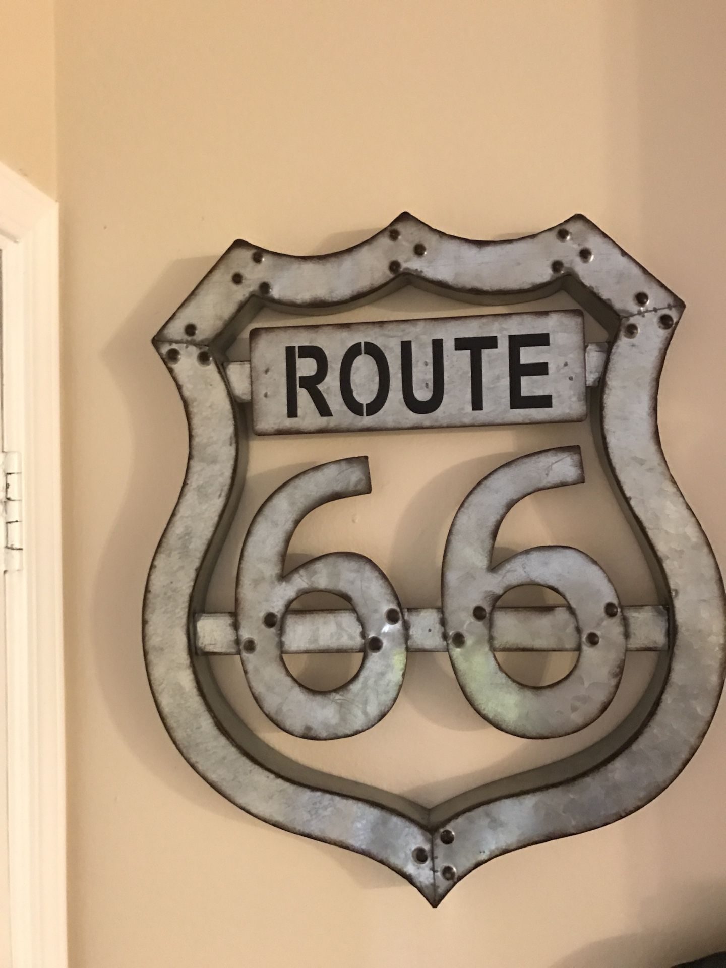 Vintage metal Route 66 wall decor sign