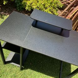 Like new///Black desk with built-in monitor riser & shelves 