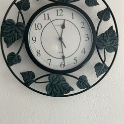 Battery Operated Light Weight Click Black Clock With Dark Green Leaves