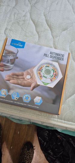 Automatic pill dispenser
