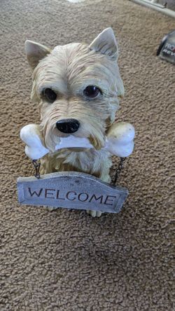 Welcome 🐕🐶 statue