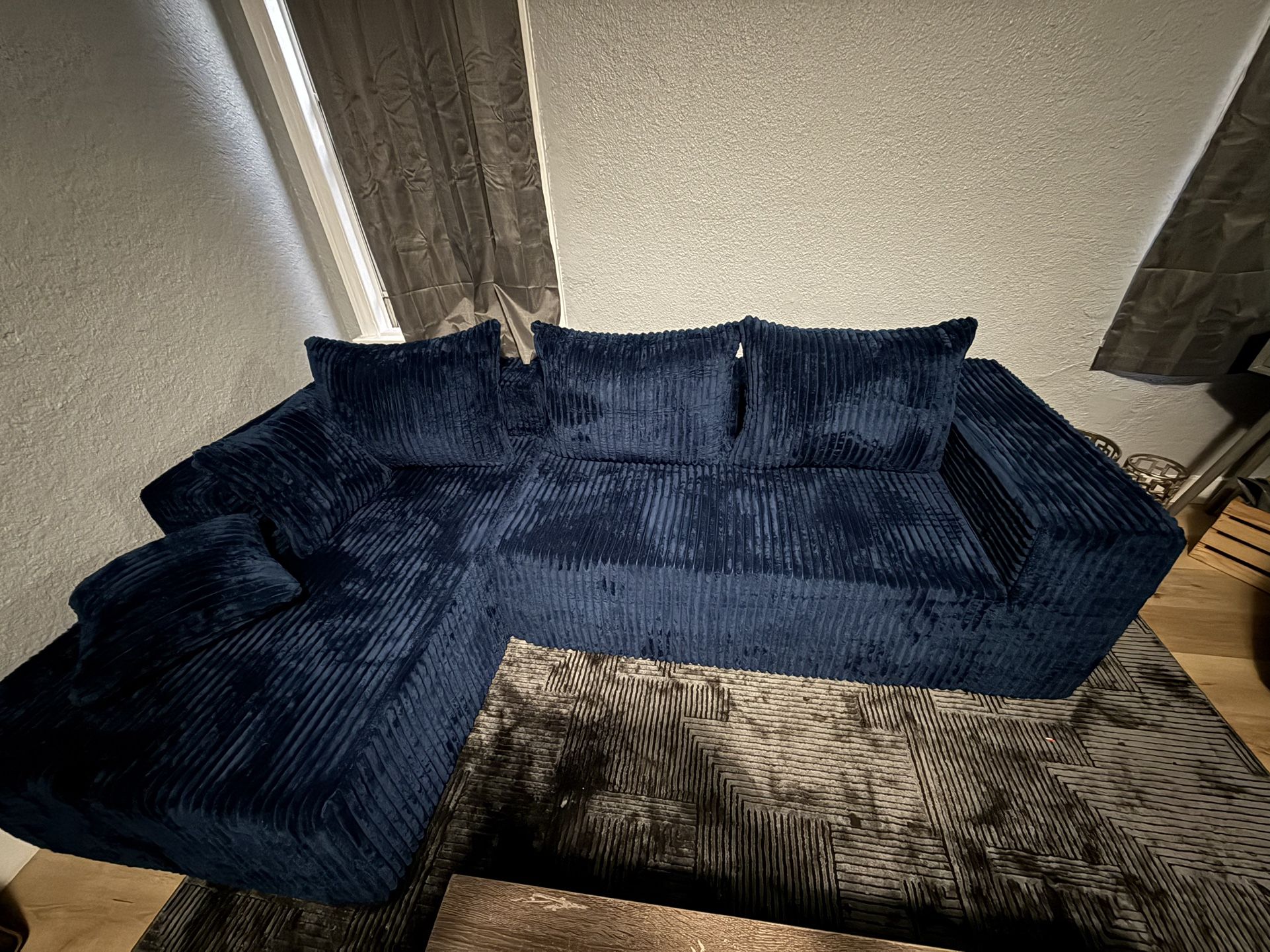 Brand new blue corduroy couch for sale