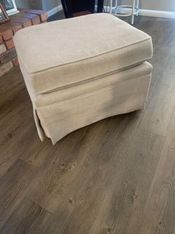 Free- cream colored rocking ottoman