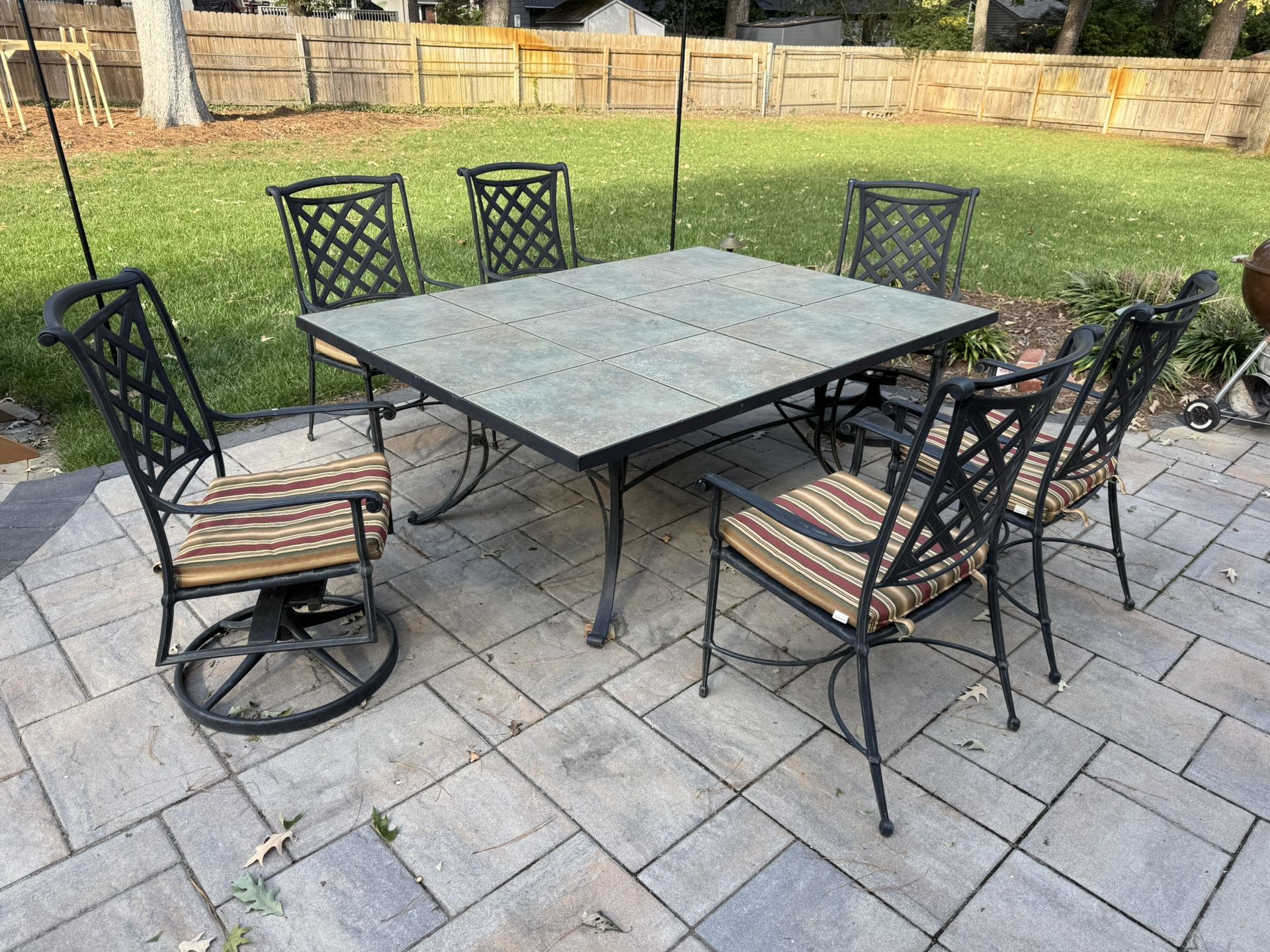 High-Quality Wrought Iron Patio Dining Set – Tile Top Table + 6 Chairs (2 Swivel Rockers)