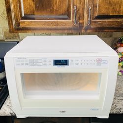 LG  LRMM1430SW 1.4 Cu. Ft. Orbit Round Cavity Countertop Microwave w/ Monitor Style Door & SmartWave Technology: White