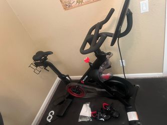 Peloton bike and mat