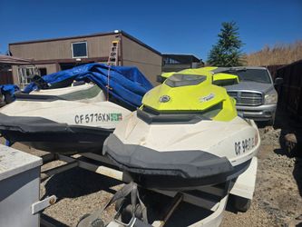 TWO JET SKI AND TRAILER