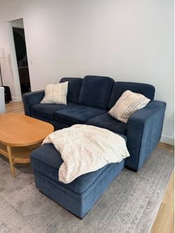 Blue couch with storage and ottoman