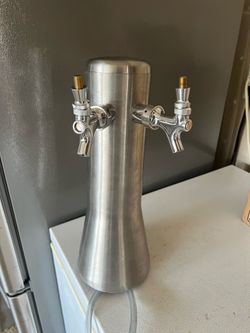 Stainless steel beer tower.