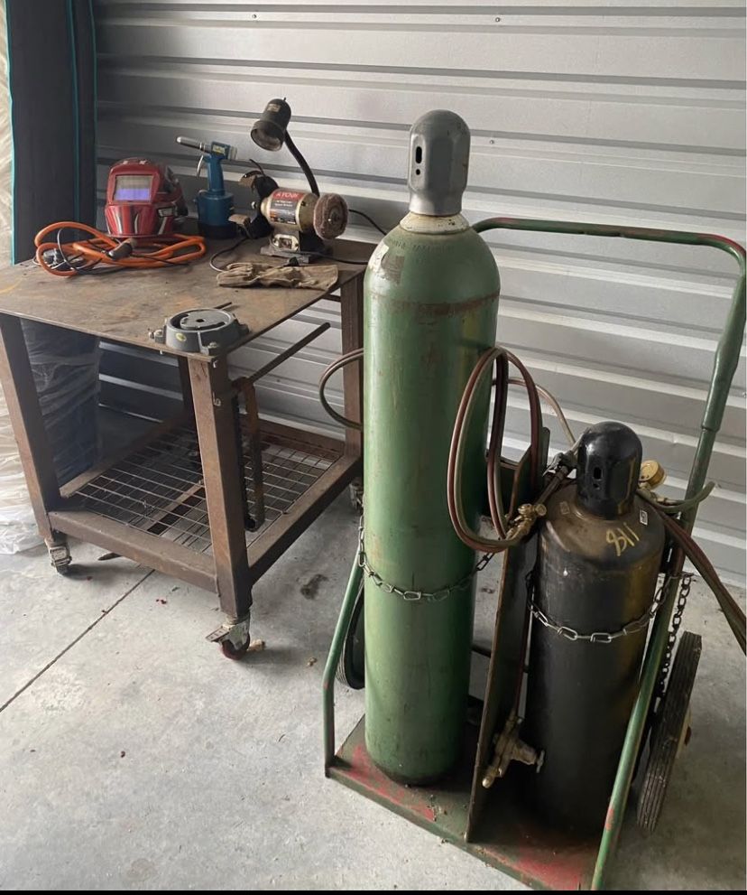 Oxygen And Acetylene Welding Welder Including 2 Wheeled Cart, Torch Hoses, welding table. Welding helmet great deal $850 for everything in the p