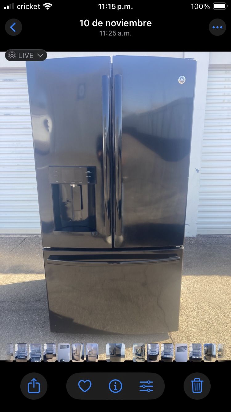 GE French Door refrigerator, black, with water and ice dispenser, in good, clean, and attractive condition. One-month warranty. Delivery available. W3