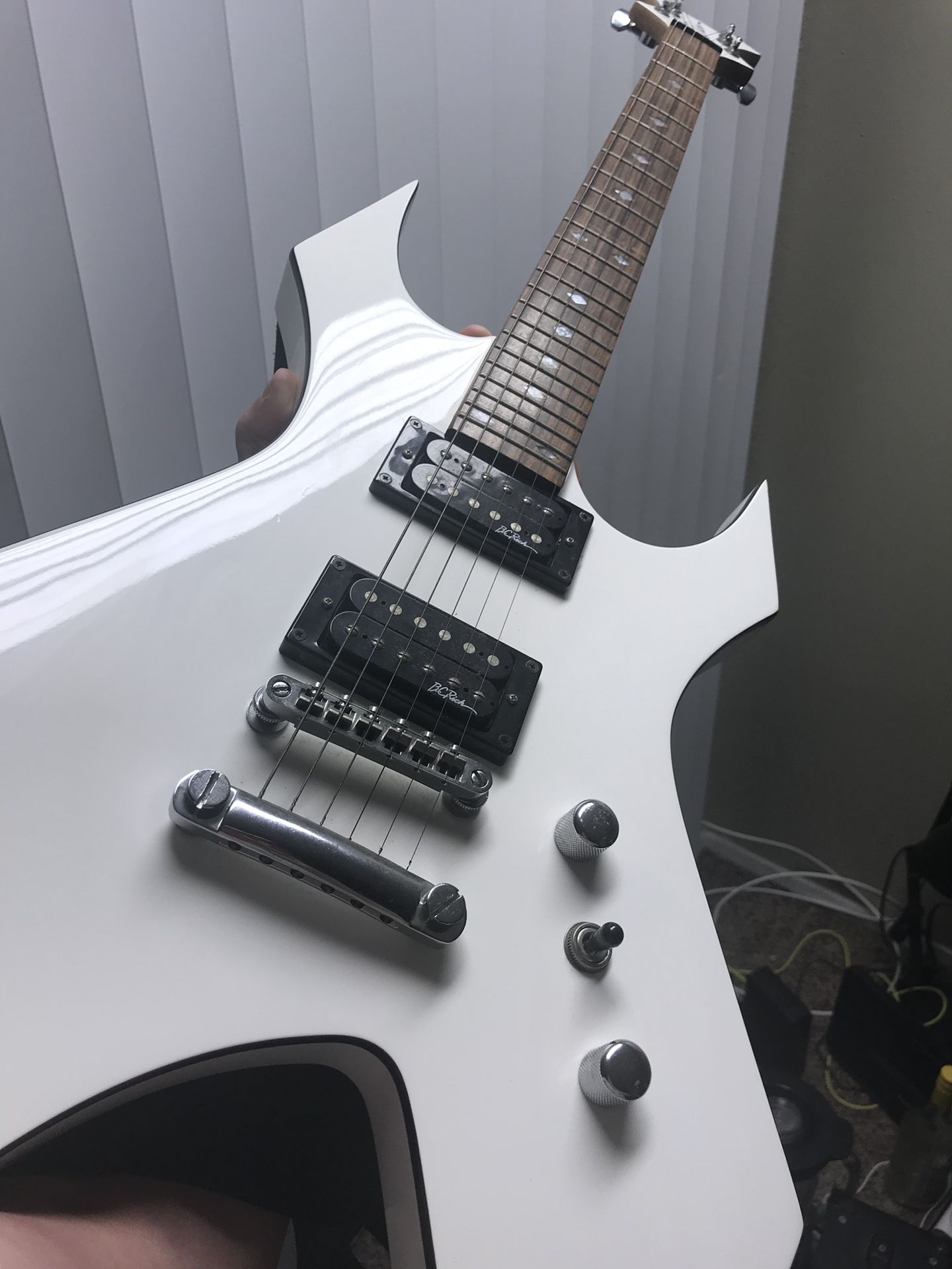 WHITE BC RICH WARLOCK ELECTRIC GUITAR W/BATWING HEAD STOCK & STAND
