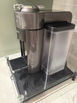 Nespresso Vertuo coffee maker descaling pods and storage Container