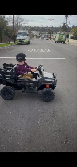 Black ride on tractor truck