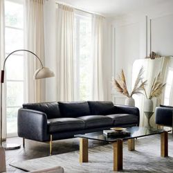 Cb2 coffee table and black leather couch