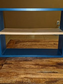Blue wooden shelf