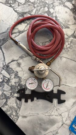 Smith tank gauge and torch