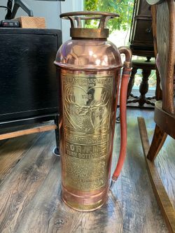 Old copper elk hart fire extinguisher