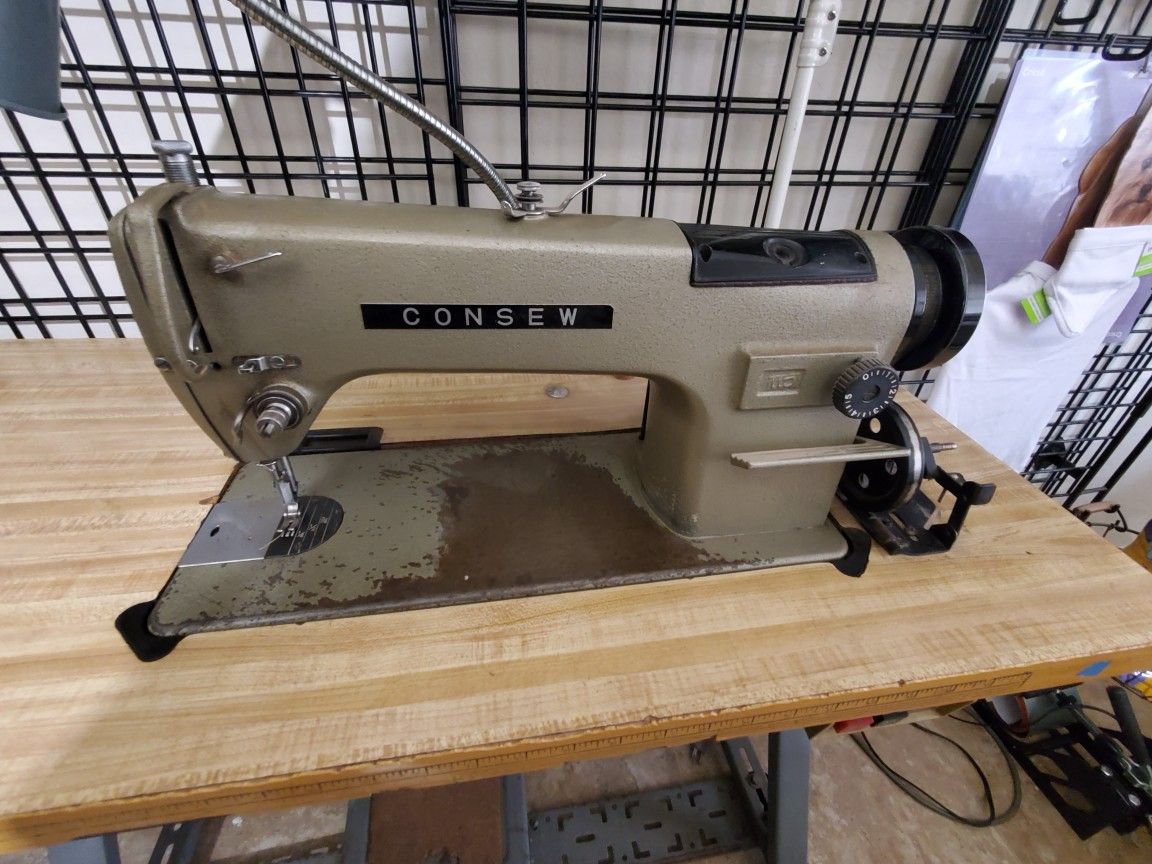 Consew industrial sewing machine with table for Sale in Phoenix, AZ