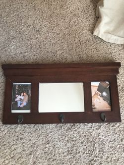 Wall frame with mirror, coat hooks