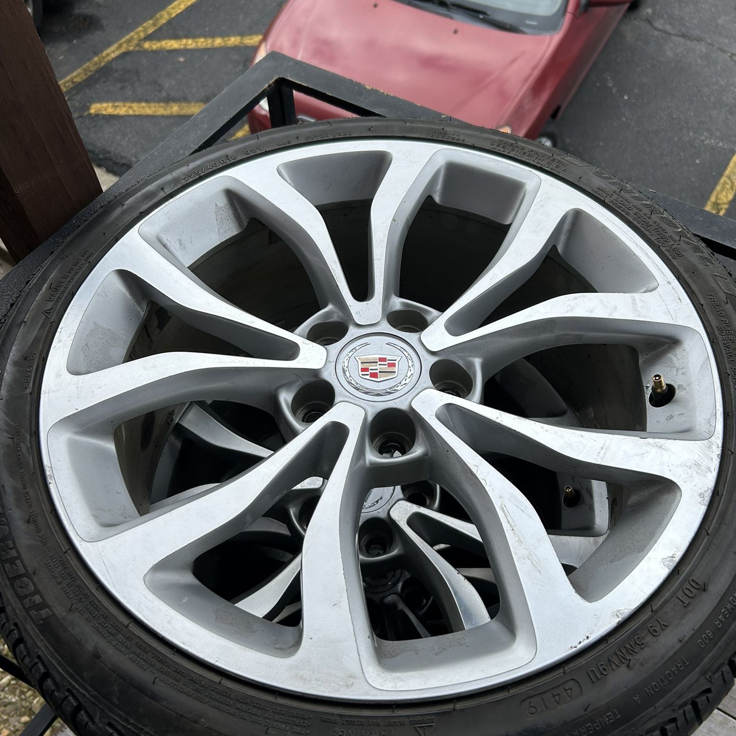 removed)-245 R 4018 inch Cadillac ATS rims and tires firm $1(contact info removed) for the set tires still like New