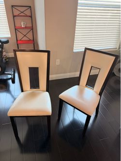 2 Black and white chairs