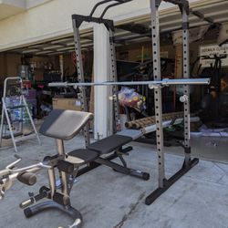 All Brand new power cage combo with fully Adjustable bench and 300lb Olympic weight set