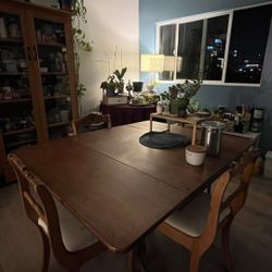 Wooden Table With Four Chairs