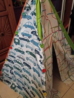 This item is a children's teepee tent, likely the Pacific Play Tents Traffic Jam Interchangeable Teepee.