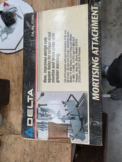 Delta drill press mortising attachment