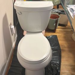 KohlerToilet Seat height Soft Close. Round. Was In Guest bathroom Barely Used. 