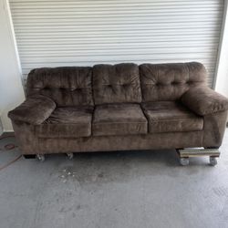 Brown cloth couch