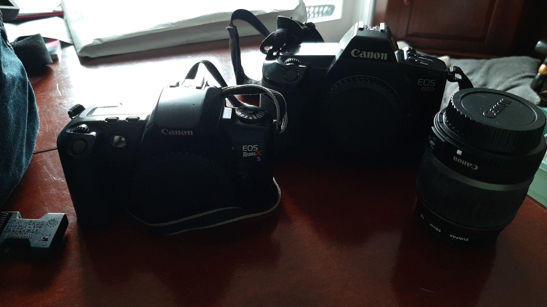 2 Cameras and a lens (Canon EOS 650 & Canon EOS Rebel X S)