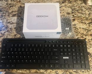 GEEKOM A8 Max Ryzen 7 8745HS Mini PC + Keyboard, Mouse & Mousepad – No RAM/SSD/OS