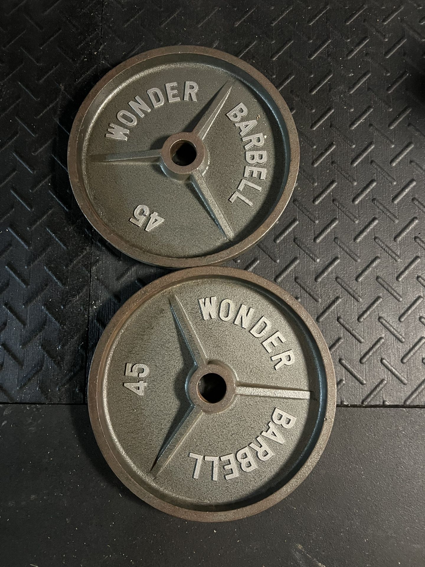 Weights. 45lb Plates And 70lb Dumbbell