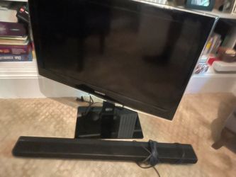 Samsung 32 inch TV with adjustable mount and sound bar