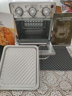 Mini countertop air fryer. Also bakes,broils, and toasts. Only taken out of box for pic.