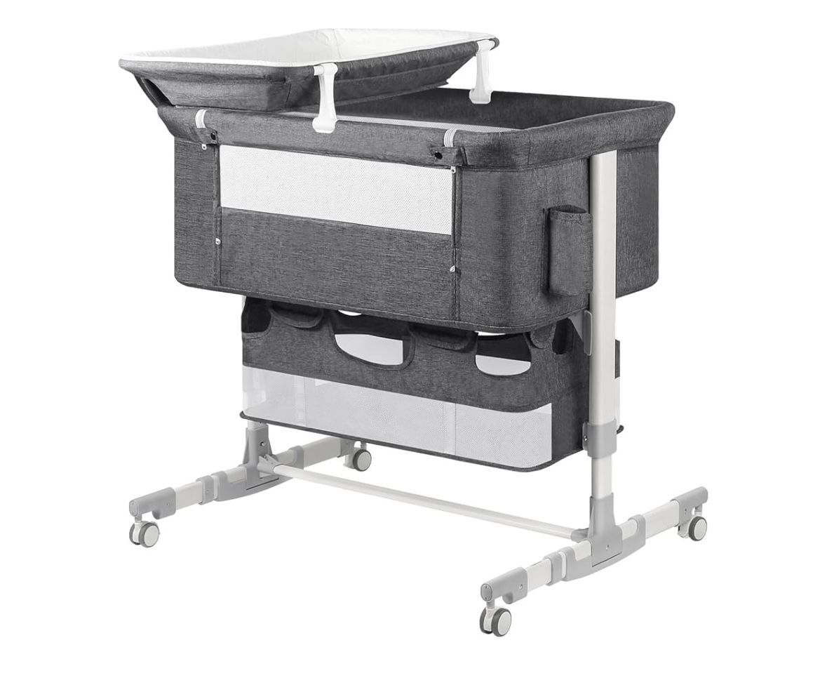 Bassinet bedside crib, chair and changing table