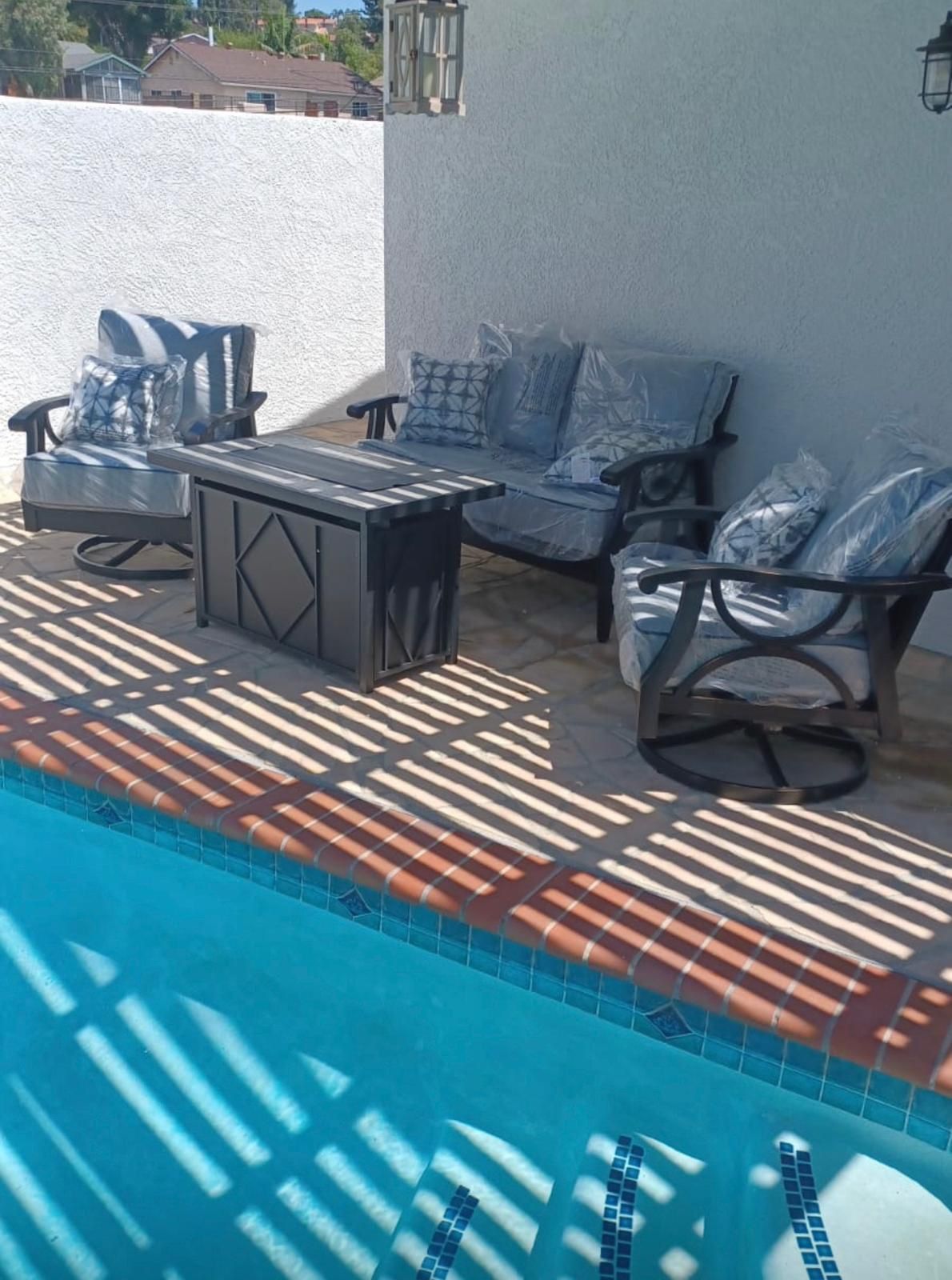 Brand new patio set sunbrella &fire pit 42